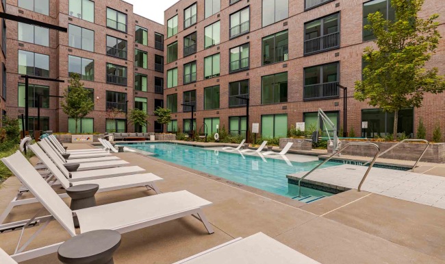 Lounge chairs with large pool